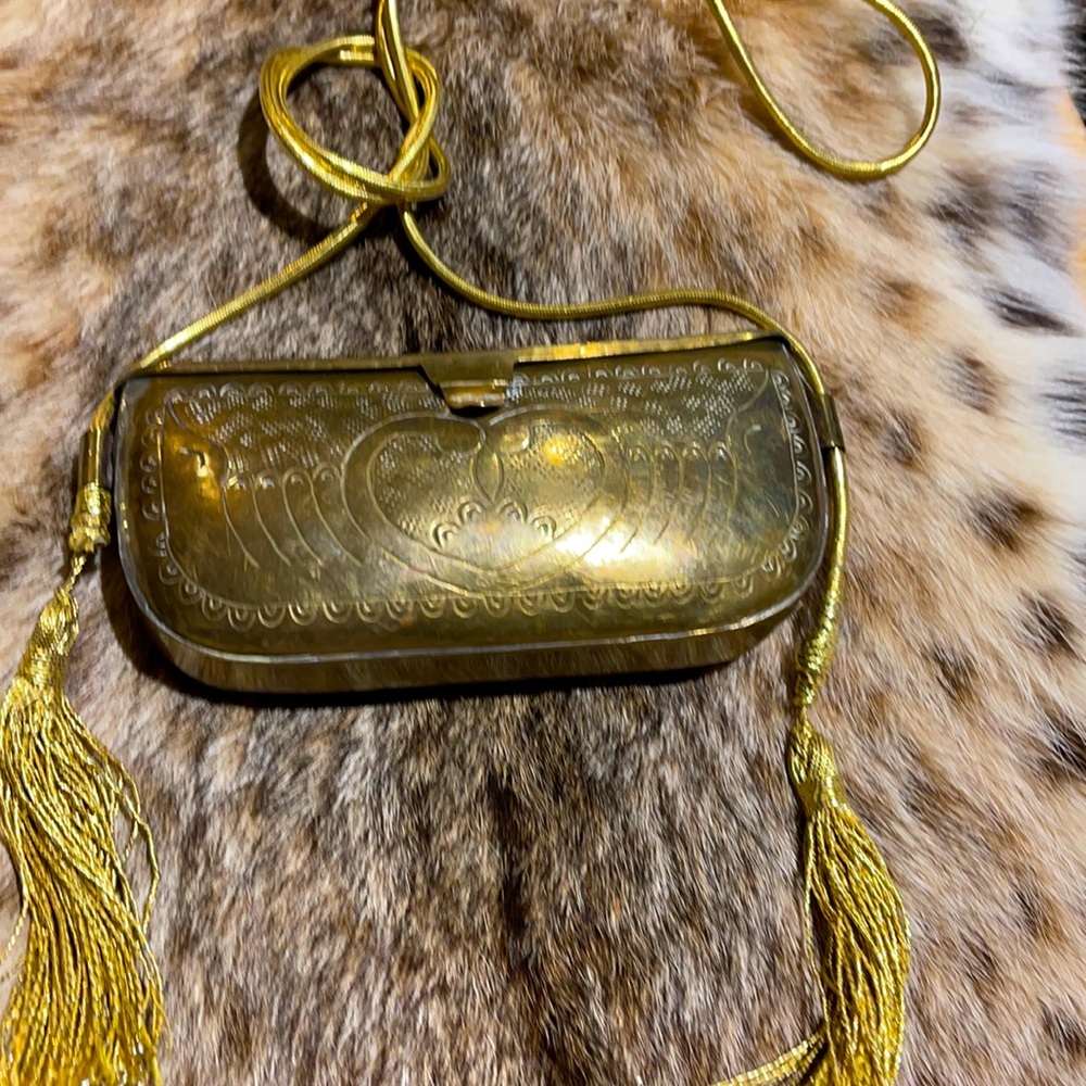 Gold metal clutch